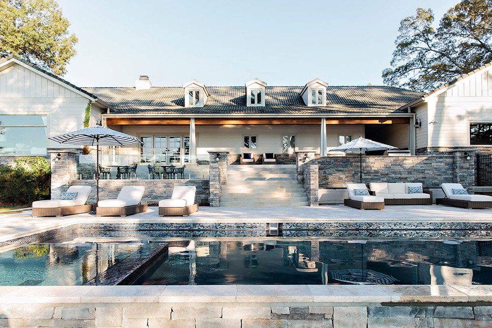 A comprehensive guide to pairing a pool deck with an outdoor kitchen